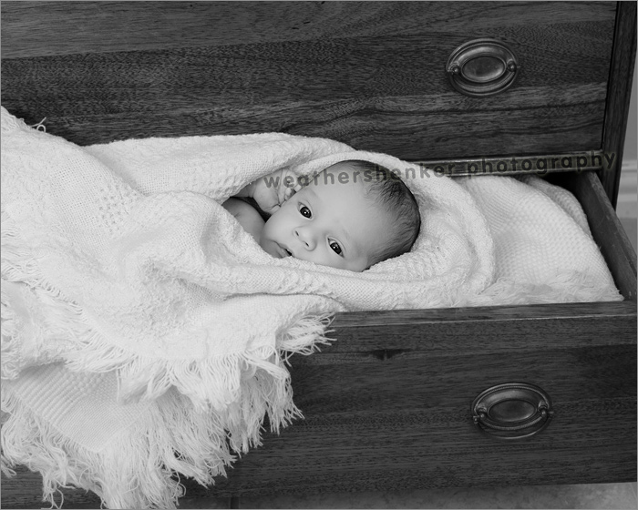 Baby photo of infant in a drawer