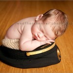 Austin newborn photography of a baby in an airplane pilot hat