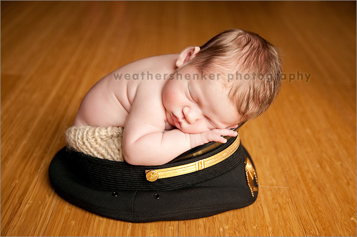 Austin newborn photography of a baby in an airplane pilot hat